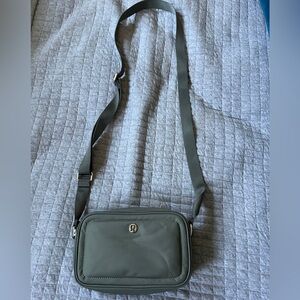 Lululemon crossbody bad in safe green, gently used